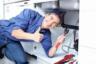 Happy plumber photo